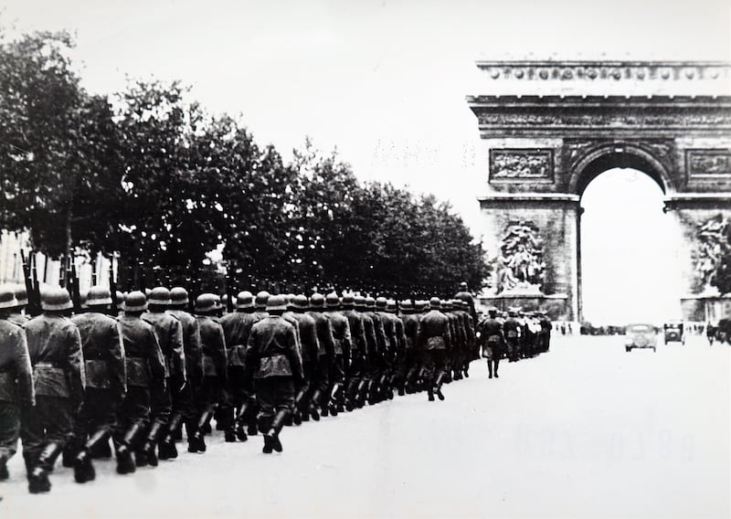 German soldiers at the Arc de Triomphe, Paris, during the invasion of France in 1940.