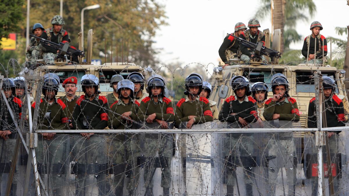 articles/2012/05/30/in-egypt-security-agencies-still-major-barriers-to-change/egypt-military-police-khalil_kabeoc