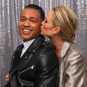 T.J. Holmes, Amy Robach portrait at the iHeartRadio Jingle Ball
