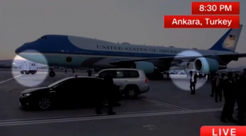 The catering truck drives away from Air Force One in Turkey.