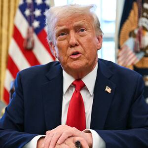 TOPSHOT - US President Donald Trump speaks to the press as he signs an executive order to create a US sovereign wealth fund, in the Oval Office of the White House on February 3, 2025, in Washington, DC. (Photo by Jim WATSON / AFP) (Photo by JIM WATSON/AFP via Getty Images)