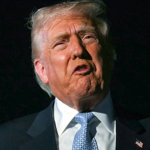 US President Donald Trump speaks with reporters before boarding Air Force One as he departs Palm Beach International Airport in West Palm Beach, Florida, on November 16, 2025.