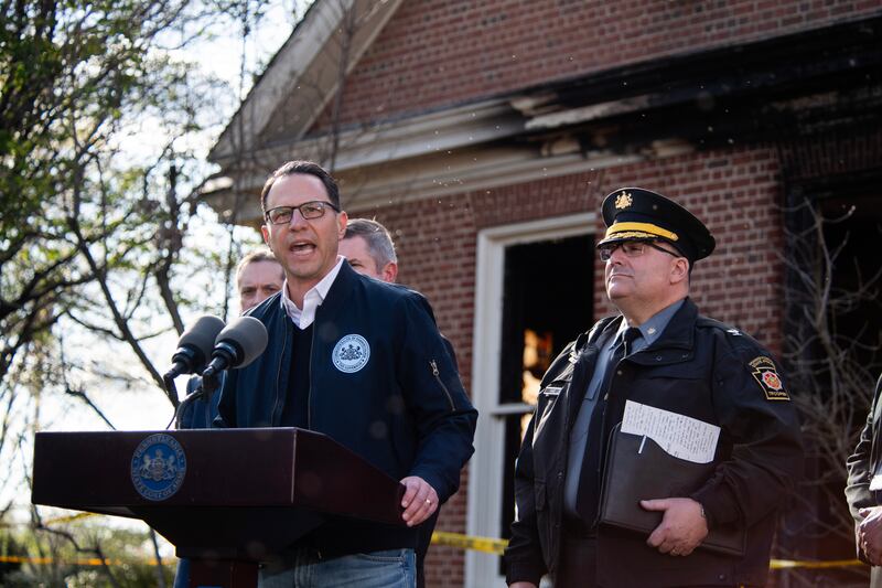 Pennsylvania Gov. Josh Shapiro speaks during a press conference outside of the Governor's Mansion after a portion of the property was damaged in an arson fire on April 13, 2025 in Harrisburg, Pennsylvania. Shapiro and his family escaped unharmed and police have a suspect, Cody Balmer, in custody.
