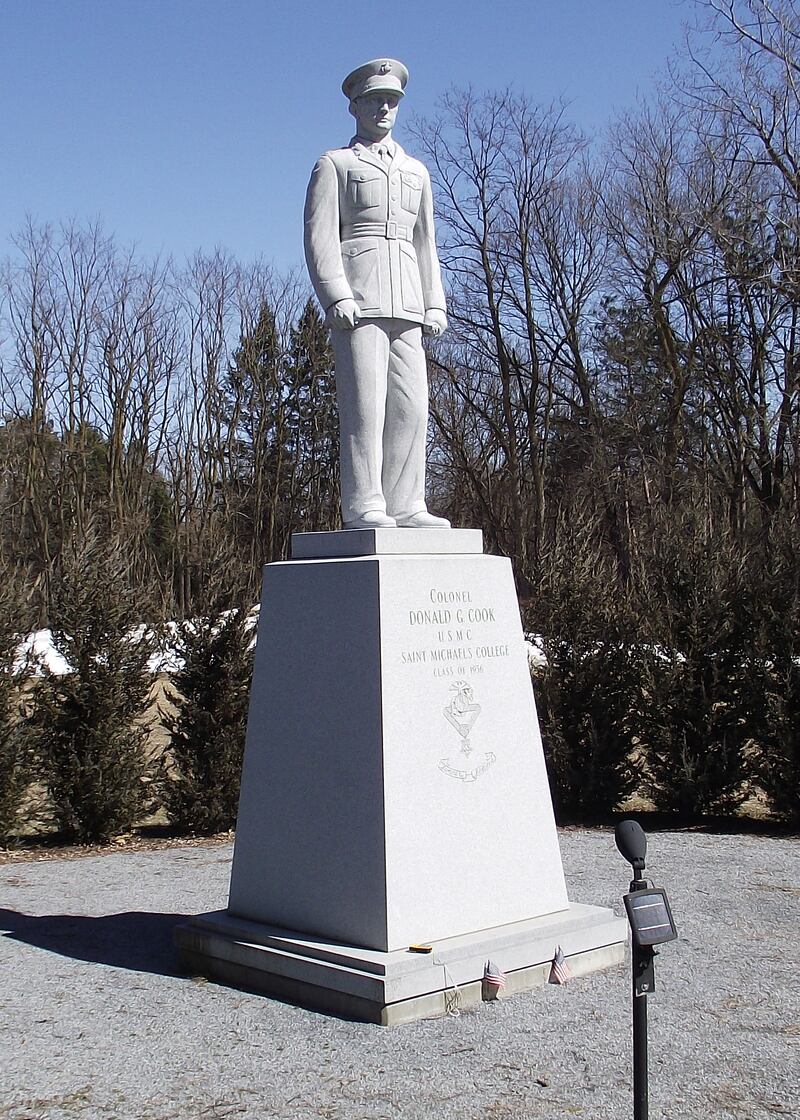 Statue of USMC Colonel Donald Cook on the campus of St. Michael's College.