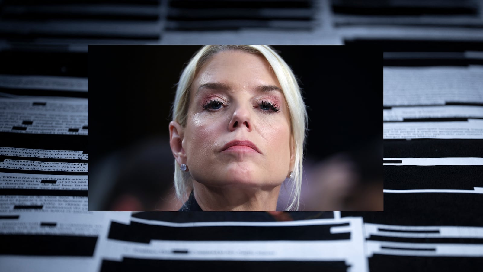 This photo illustration shows redacted documents from the Epstein Library files released by the US Department of Justice in Washington, DC, on February 18, 2026. The Epstein Files Transparency Act (EFTA), passed overwhelmingly by Congress in November 2025, compelled the Justice Department to release all of the documents in its possession related to the disgraced financier Jeffrey Epstein within 30 days. (Photo by Brendan Smialowski / AFP) / -- IMAGE RESTRICTED TO EDITORIAL USE - STRICTLY NO COMMERCIAL USE --