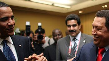 articles/2009/04/21/bring-on-the-explosive-handshakes/yglesias-chavez-handshake_23184_jawrwh