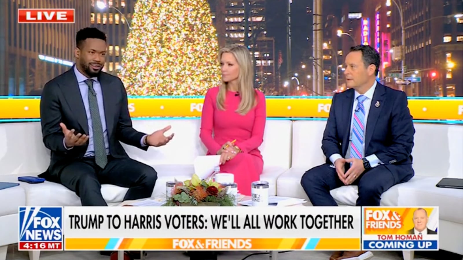 Fox & Friends co-hosts Lawrence Jones, Ainsley Earhardt and Brian Kilmeade talk during the December 9, 2024 broadcast of the show.