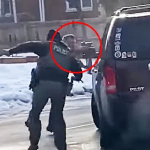 A screen grab of ICE agent Jonathan Ross, circled in red, fatally shooting Renee Nicole Good in Minneapolis, Minnesota.