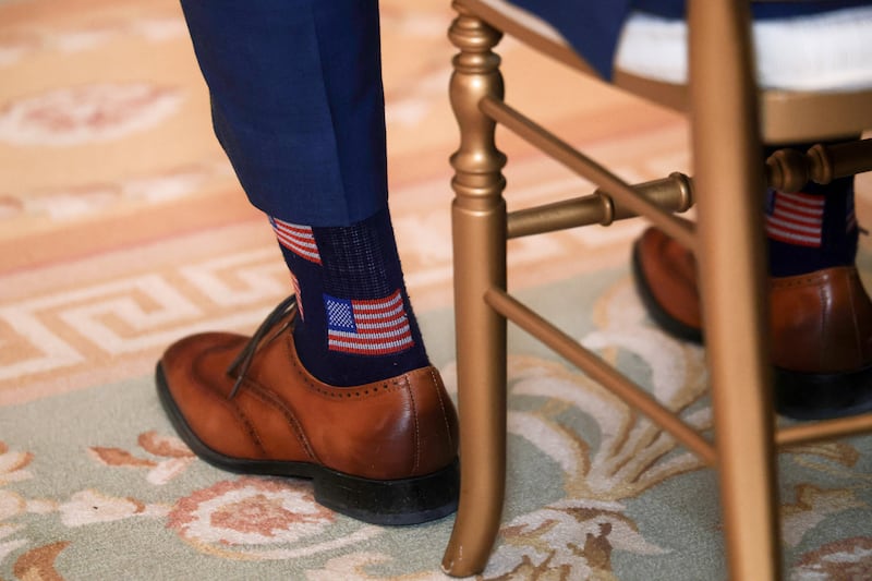 U.S. Defense Secretary Pete Hegseth wears U.S. flag-themed socks during a Medal of Honor ceremony at the White House in Washington, D.C., U.S., March 2, 2026. REUTERS/Jonathan Ernst