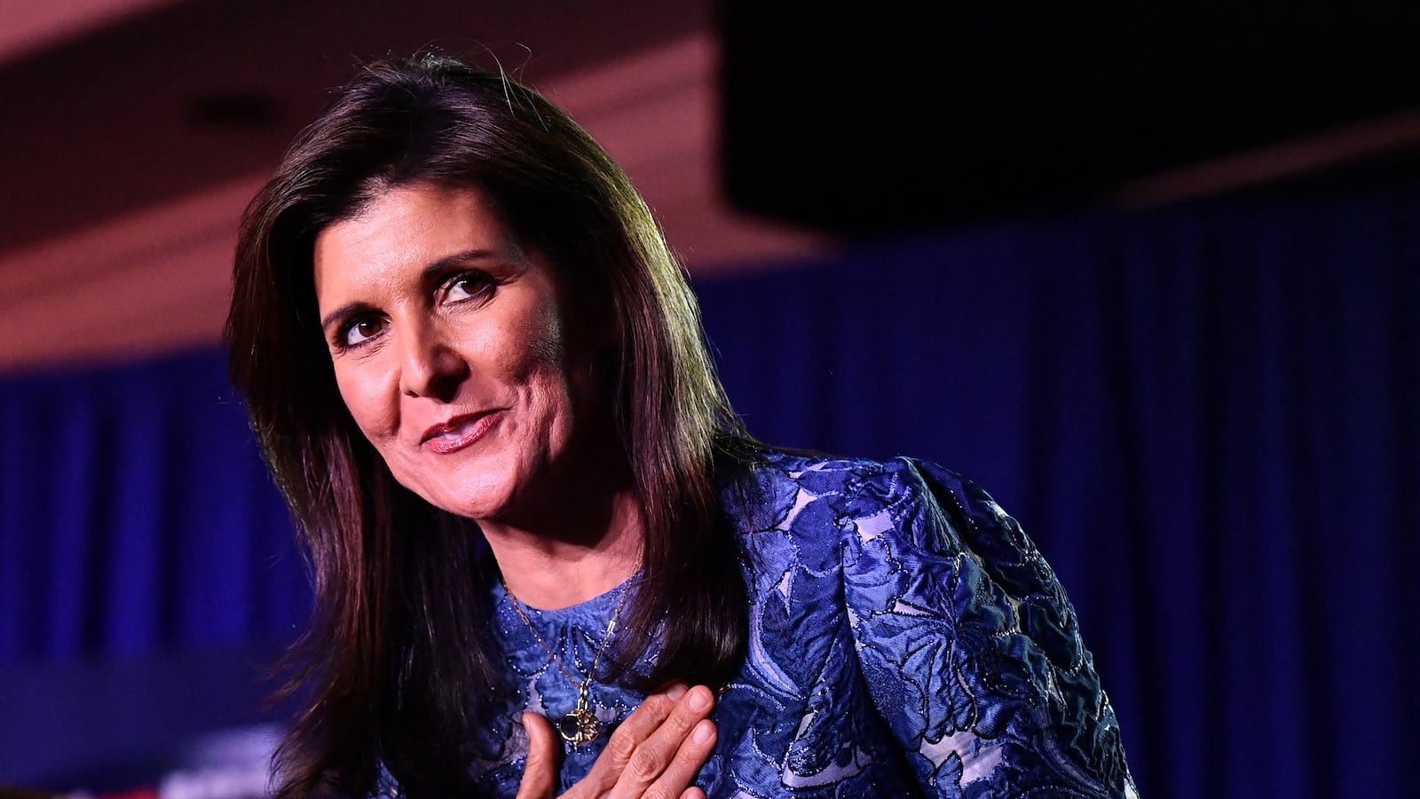 Nikki Haley sought to warn Republican voters away from rival Donald Trump after he defeated her in Tuesday's New Hampshire primary, saying nominating the controversial US ex-president would spell victory for Joe Biden in November.