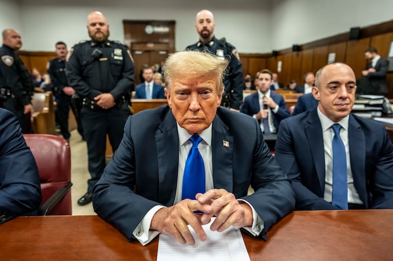 Donald Trump with attorney Emil Bove attends his criminal trial at Manhattan Criminal Court on May 30, 2024 in New York City. T