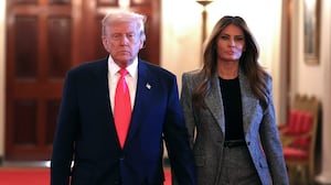 WASHINGTON, DC - NOVEMBER 13: U.S. President Donald Trump and first lady Melania Trump arrive for the signing ceremony for the "Fostering the Future" executive order in the East Room of the White House on November 13, 2025 in Washington, DC.
