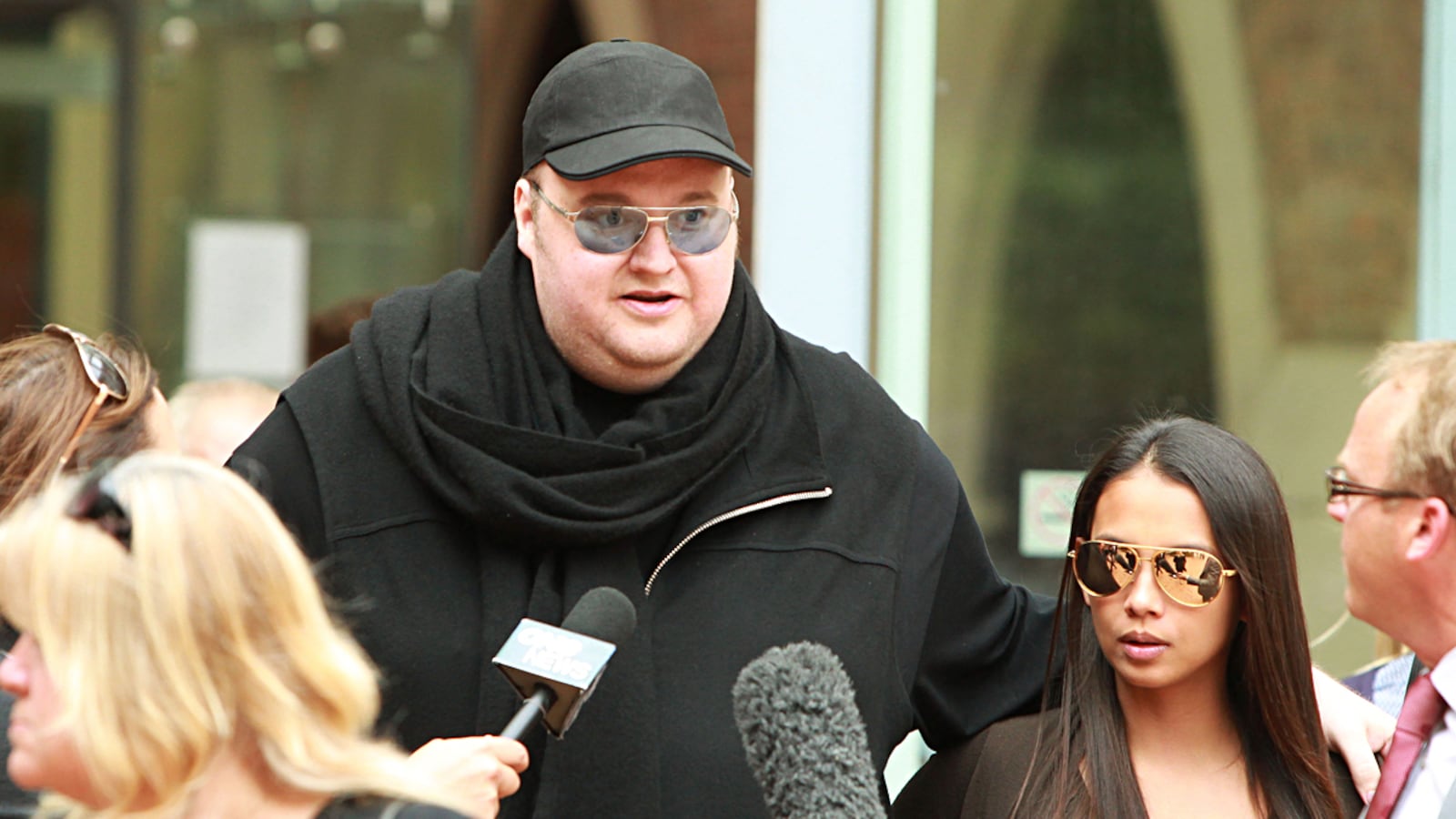 articles/2012/07/12/the-rise-and-fall-of-kim-dotcom-and-megaupload-10-burning-questions-answered/megaupload-singal-tease_yzd9jl