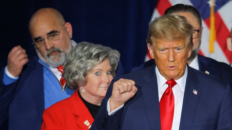 Donald Trump with his campaign advisers Susie Wiles and Chris LaCivita
