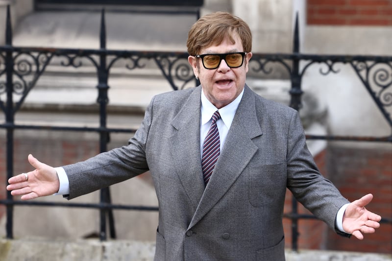 Elton John leaves the High Court in London, Britain