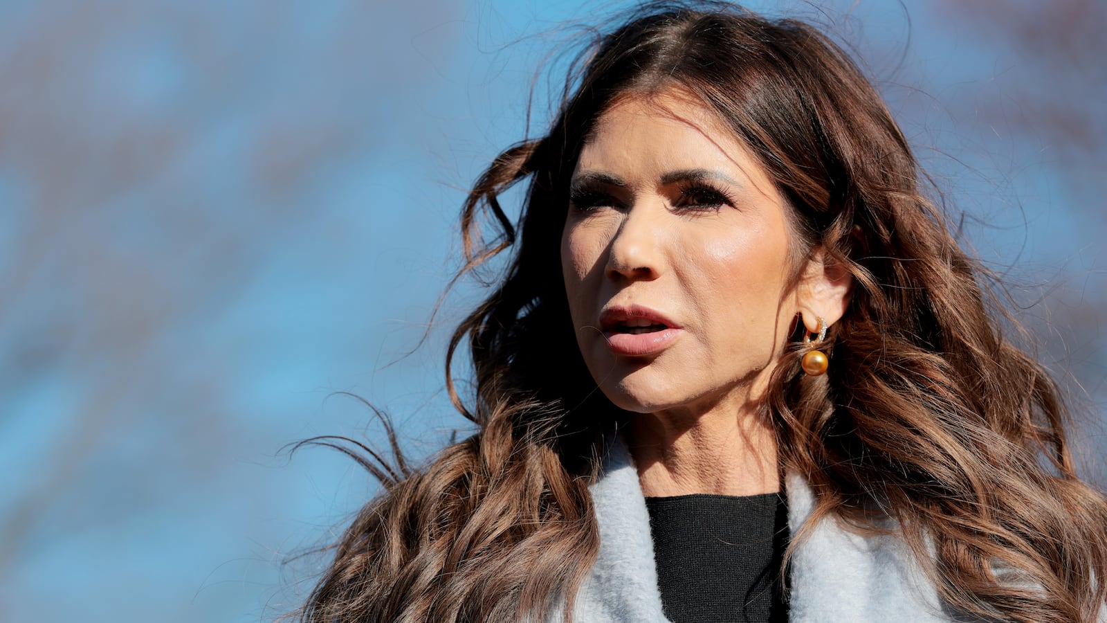 Secretary of Homeland Security Kristi Noem speaks to reporters outside of the White House on January 15, 2026.