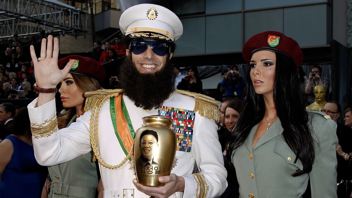 cheats/2012/02/26/sacha-baron-cohen-dumps-ashes-on-seacrest/sacha-baron-cohen-dictator-oscars-cheat_q3powt