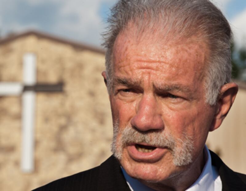 articles/2010/09/11/terry-jones-inside-his-church-and-quran-burning-plans/becker-koran-burning_170798_nqrflp