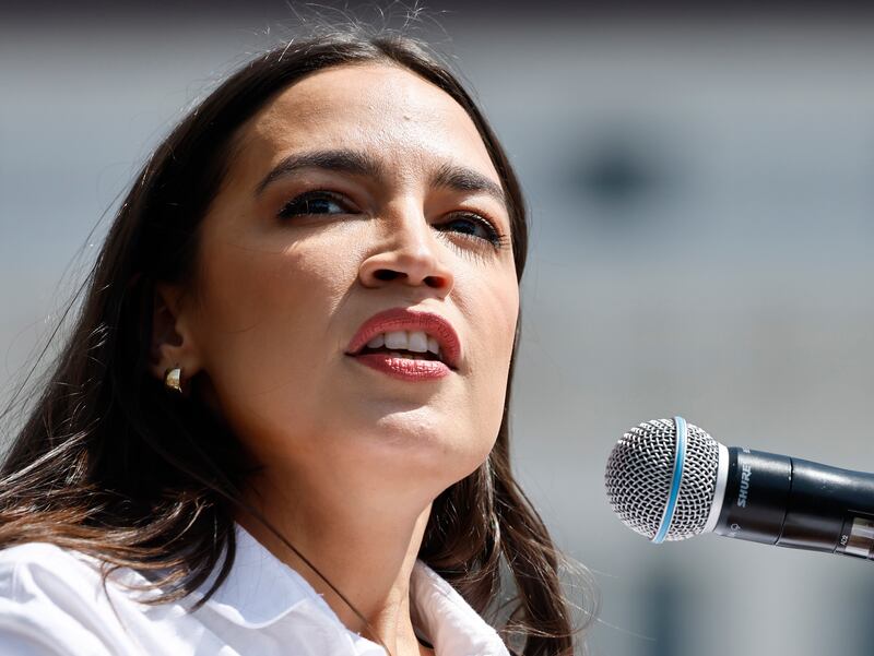 LOS ANGELES, CALIFORNIA - APRIL 12: Rep. Alexandria Ocasio-Cortez (D-NY) speaks during a stop on the ‘Fighting Oligarchy’ tour with U.S. Sen. Bernie Sanders (I-VT) at Grand Park on April 12, 2025 in Los Angeles, California. An estimated 36,000 people attended the rally which also saw Neil Young and Joan Baez perform. (Photo by Mario Tama/Getty Images)