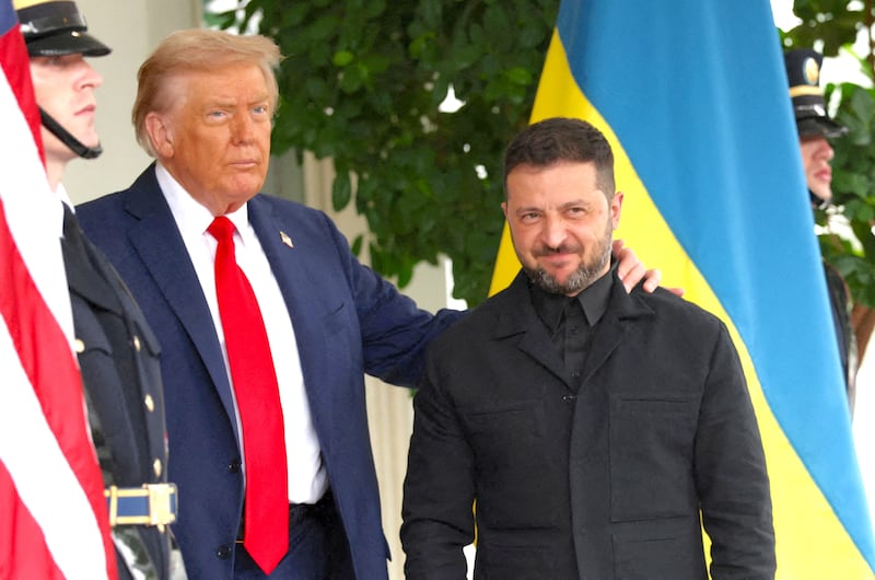 President Donald Trump greets Ukrainian President Volodymyr Zelenskiy at the White House, amid negotiations to end the Russian war in Ukraine, in Washington, D.C., U.S., August 18, 2025.