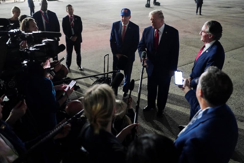 President Donald Trump speaks to the members of the media, after attending Game 3 of the NBA Finals, at John F. Kennedy International Airport in New York, U.S., June 8, 2026.