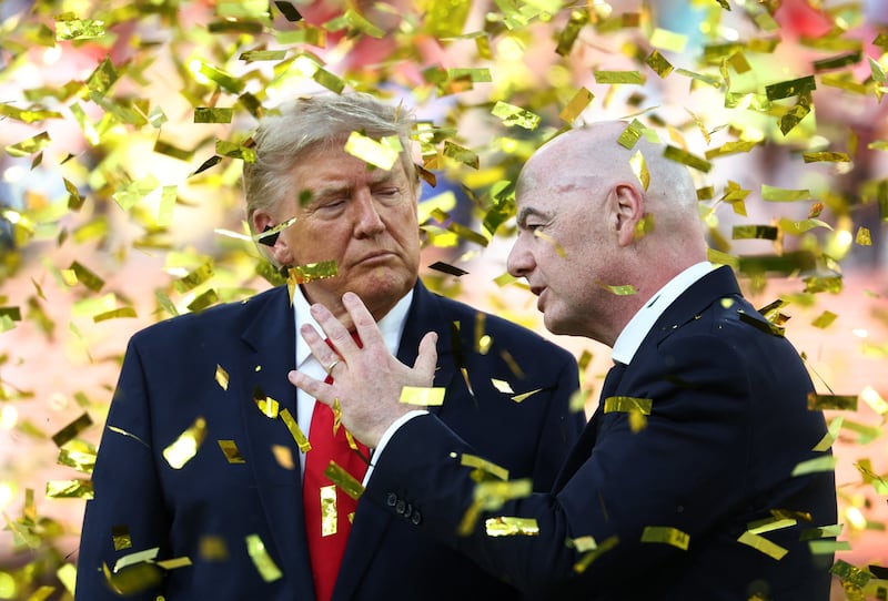 Soccer Football - FIFA World Cup 2026 - Final - Spain v Argentina - New York/New Jersey Stadium, East Rutherford, New Jersey, U.S. - July 19, 2026 U.S. President Donald Trump and FIFA President Gianni Infantino during the trophy presentation after the match IMAGN IMAGES via Reuters/Mark J Rebilas