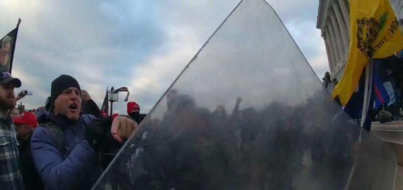 Jared Wise is seen in the middle of the Jan. 6 riot.