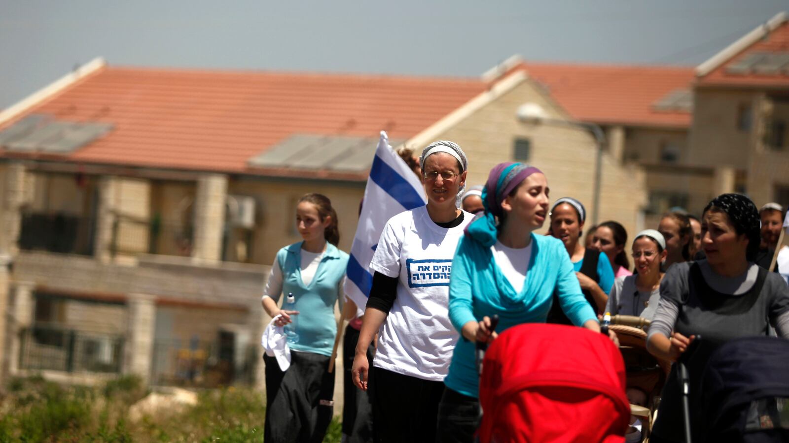 articles/2012/06/07/netanyahu-removes-settlement-housing-and-then-promises-to-build-much-more/openz-ulpana-protesters_p70khc