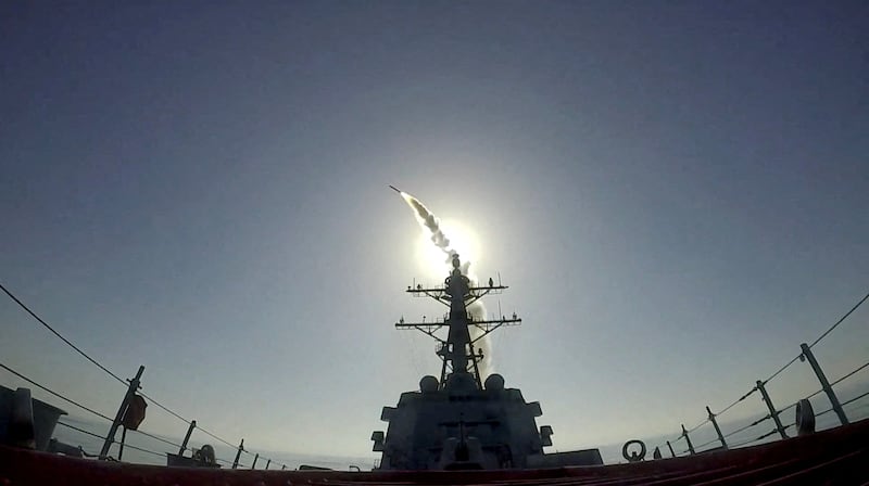 The USS Frank E. Petersen Jr. fires a Tomahawk missile at targets in Iran in March. President Donald Trump says American warships are “being reloaded with the best ammunition” to resume strikes if peace talks fall apart.