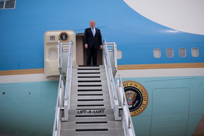 U.S. President Donald Trump speaks as he departs Beijing Capital International Airport aboard Air Force One, in Beijing, China, May 15, 2026. REUTERS/Evan Vucci