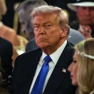 PALM BEACH, FLORIDA - OCTOBER 31: US President Donald Trump talks with guests during a Halloween party at his Mar-a-Lago estate on October 31, 2025 at Palm Beach, Florida. Trump is spending the weekend at his Mar-A-Lago estate in Palm Beach, Florida. (Photo by Samuel Corum/Getty Images)