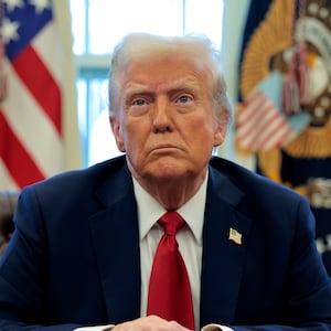 WASHINGTON, DC - JANUARY 30: U.S. President Donald Trump talks to reporters from the Resolute Desk after signing an executive order to appoint the deputy administrator of the Federal Aviation Administration in the Oval Office at the White House on January 30, 2025 in Washington, DC. Trump also signed a memorandum ordering an immediate assessment of aviation safety and ordering an elevation of what he called “competence” over “D.E.I.” (Photo by Chip Somodevilla/Getty Images)