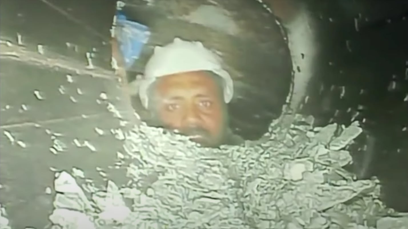 First images showing workers trapped in a collapsed tunnel in India.