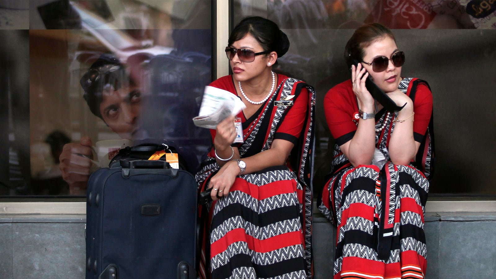 articles/2015/09/15/airline-grounds-125-flight-attendants-for-being-fat/150914-strochlic-air-india-tease_w5tf37