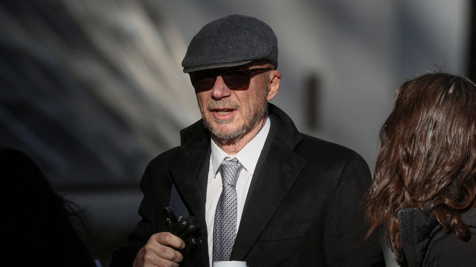 Director Paul Haggis arrives at New York court for his civil rape trial.