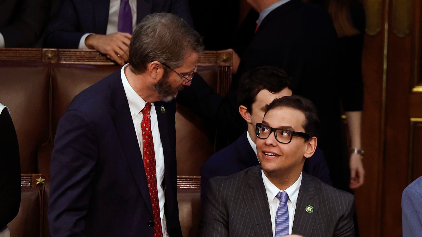 Rep.-elect George Santos (R-NY) (C) talks to Rep.-elect Tim Burchett (R-TN).