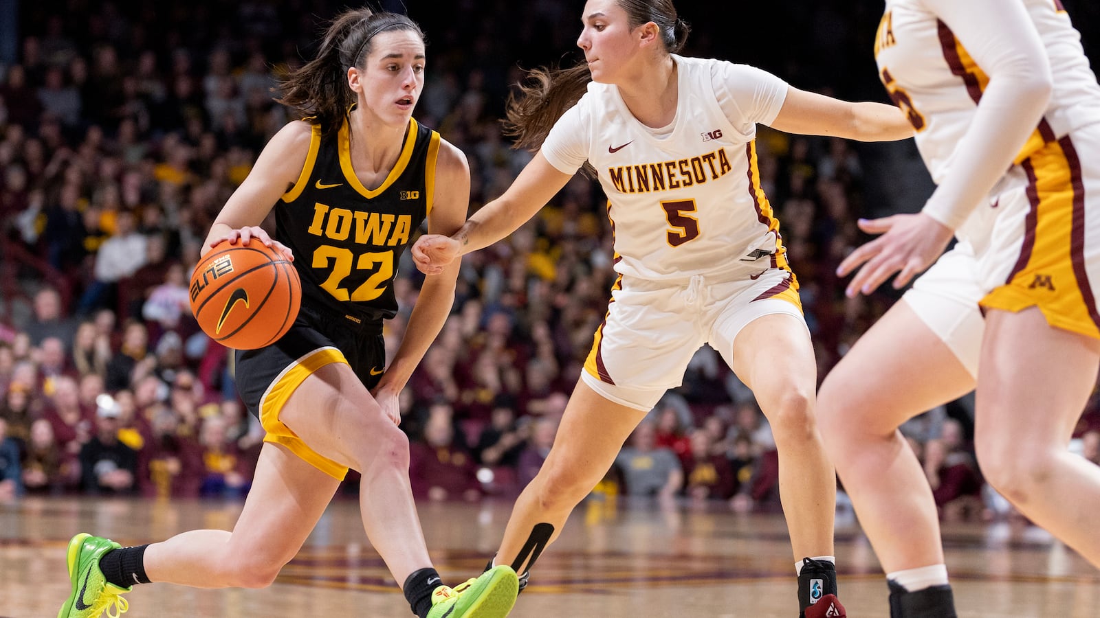 Caitlin Clark (22) of the University of Iowa Hawkeyes is defended by Maggie Czinano (5) of the University of Minnesota Golden Gophers in the third quarter Wednesday, February 28, 2024, at Williams Arena in Minneapolis, Minn.