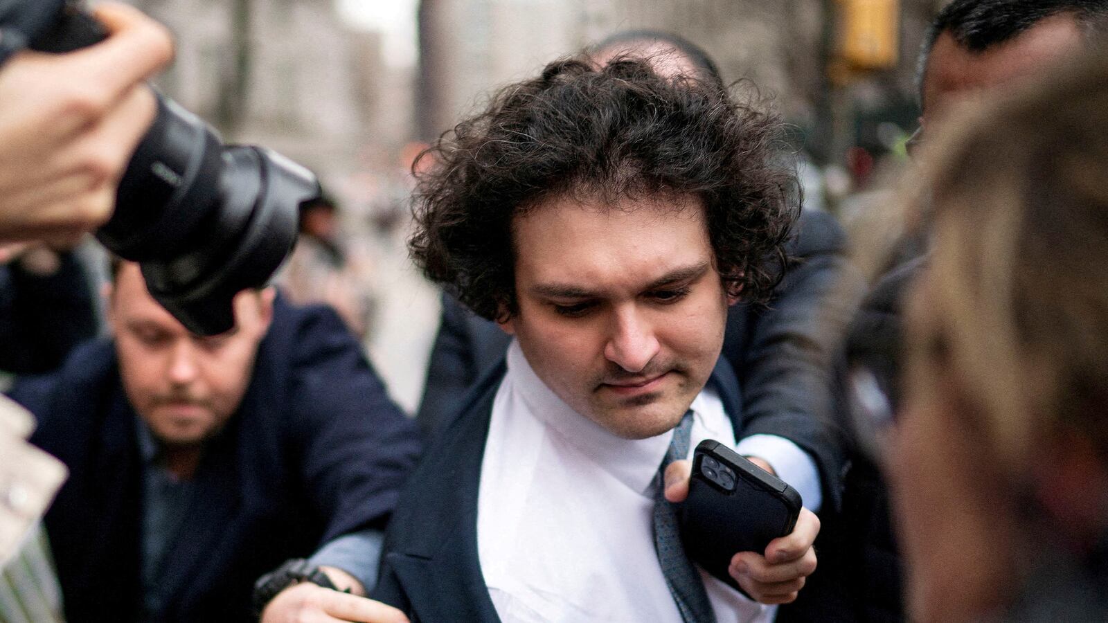 Sam Bankman-Fried, who faces fraud charges over the collapse of the bankrupt cryptocurrency exchange, arrives to the Manhattan federal court in New York City, Feb. 16, 2023.