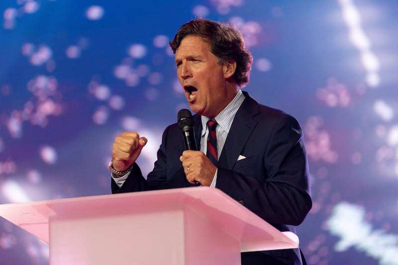 Tucker Carlson speaks during AmericaFest, the first Turning Point USA summit since the death of Charlie Kirk, in Phoenix, Arizona, U.S. December 18, 2025. REUTERS/Cheney Orr