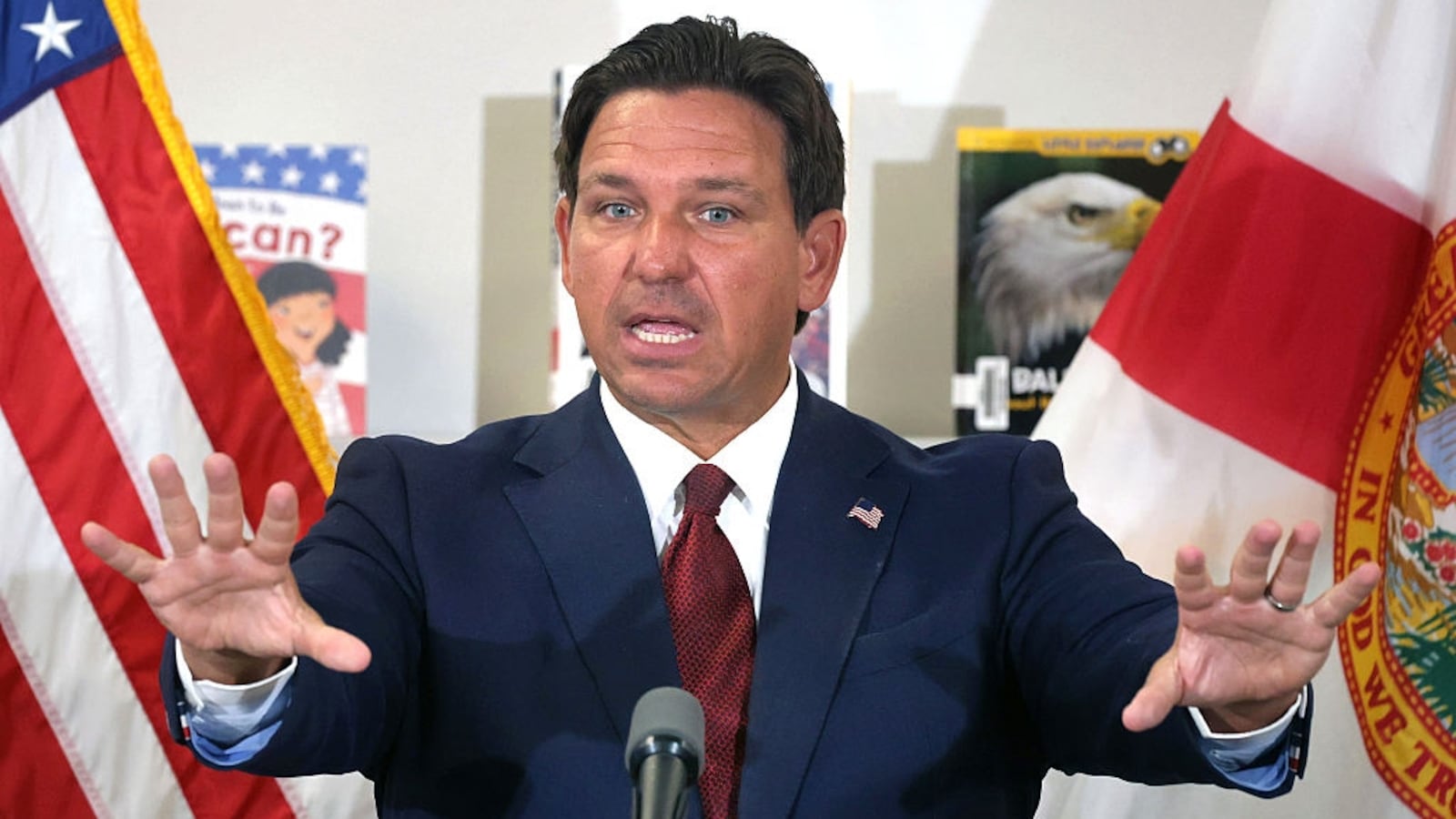Florida Gov. Ron DeSantis answers a question after announcing a lawsuit against book publishers McGraw Hill, Inc. and Savvas Learning Co., with Florida Attorney General James Uthmeier, during a press conference at Voyager K-8 School in St. Cloud, Florida, Tuesday, Aug. 19, 2025.