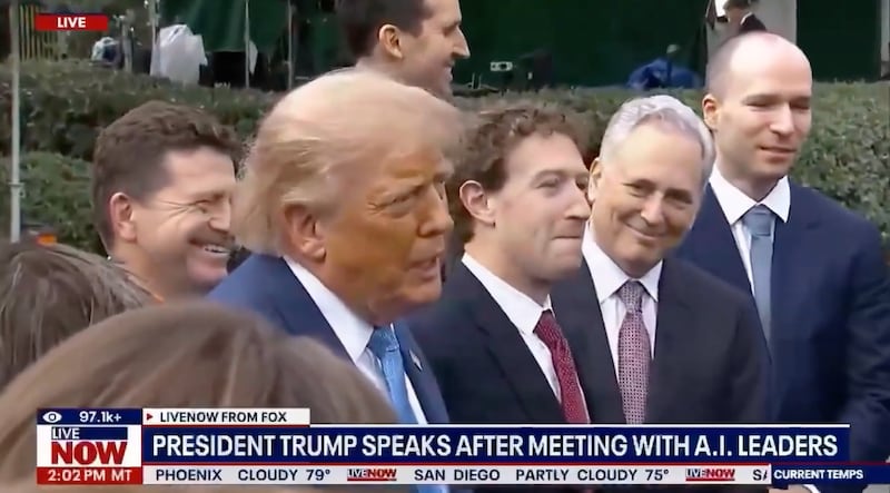 News cameras captured Mark Zuckerberg trying to hold back a smile.