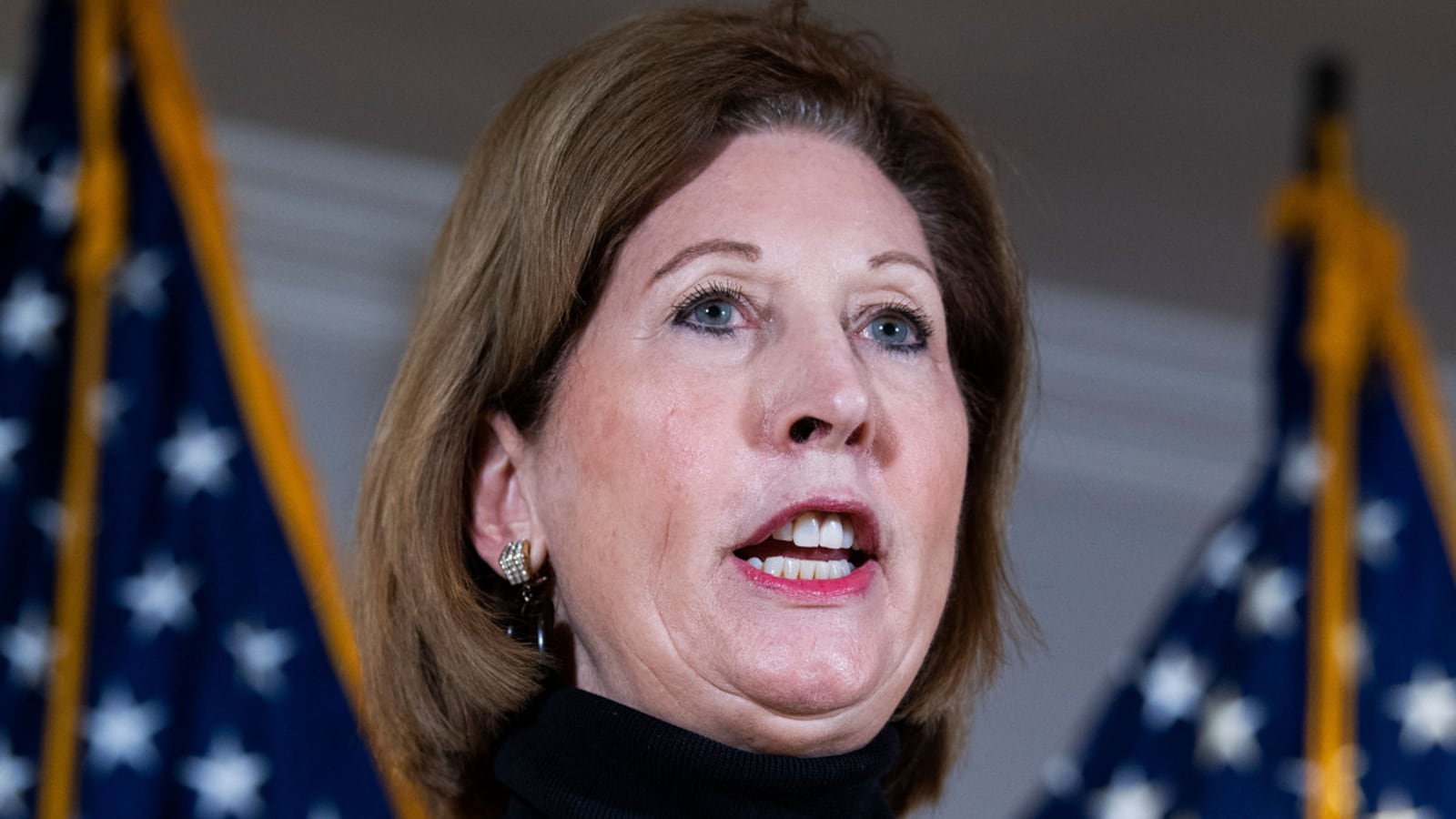 210327-lewis-sidney-powell-hero_xovwjd