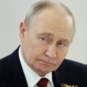 Russian President Vladimir Putin attends a meeting with Laotian President Thongloun Sisoulith at the Kremlin in Moscow, Russia May 9, 2026.