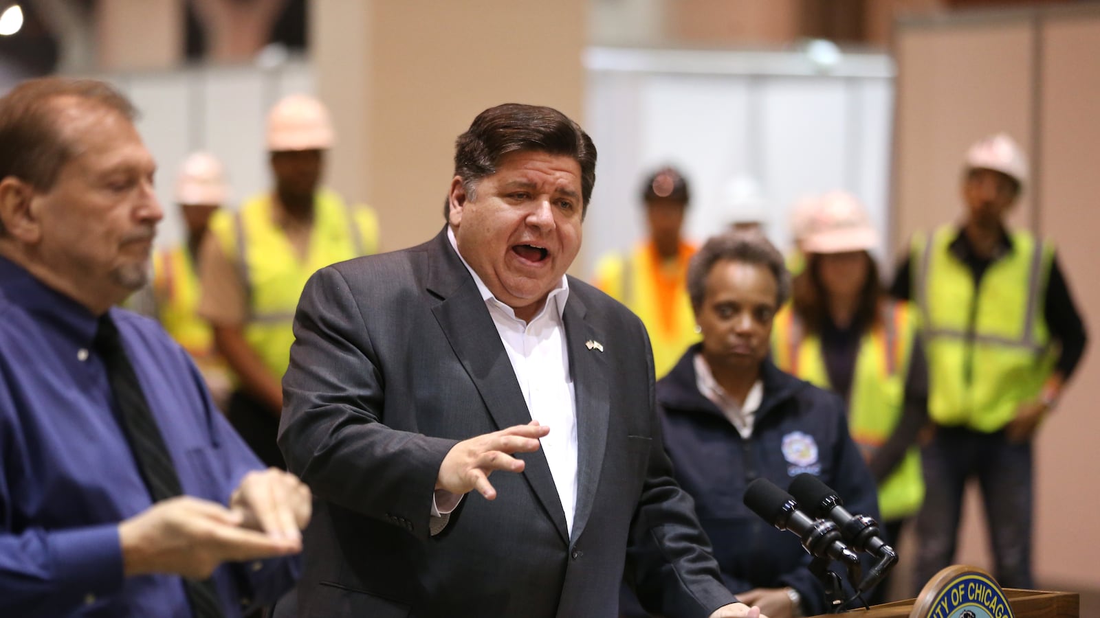 J.B. Pritzker speaks from the podium.