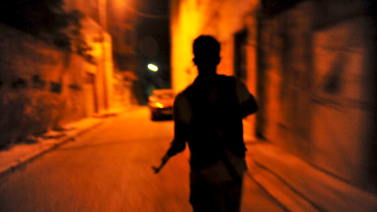 articles/2012/08/21/inside-a-syrian-rebel-city-fsa-restores-tentative-order-to-al-bab/syrian-rebel-city-banco_kwul7b