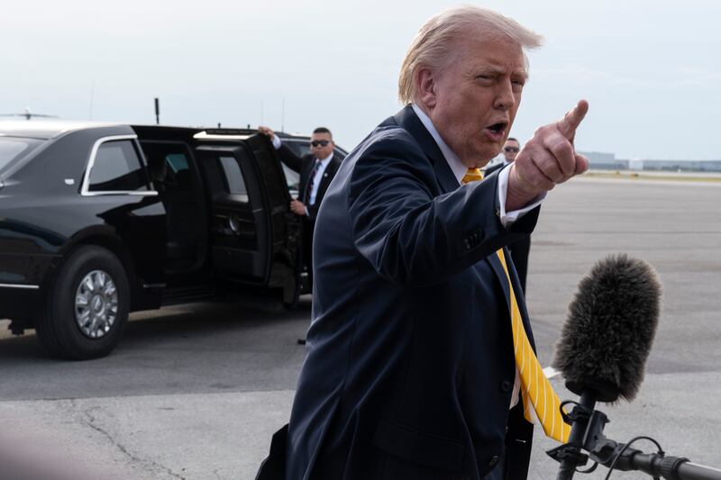 President Donald Trump speaks to journalists before boarding Air Force One at Palm Beach International Airport on May 2, 2026 in Palm Beach, Florida.