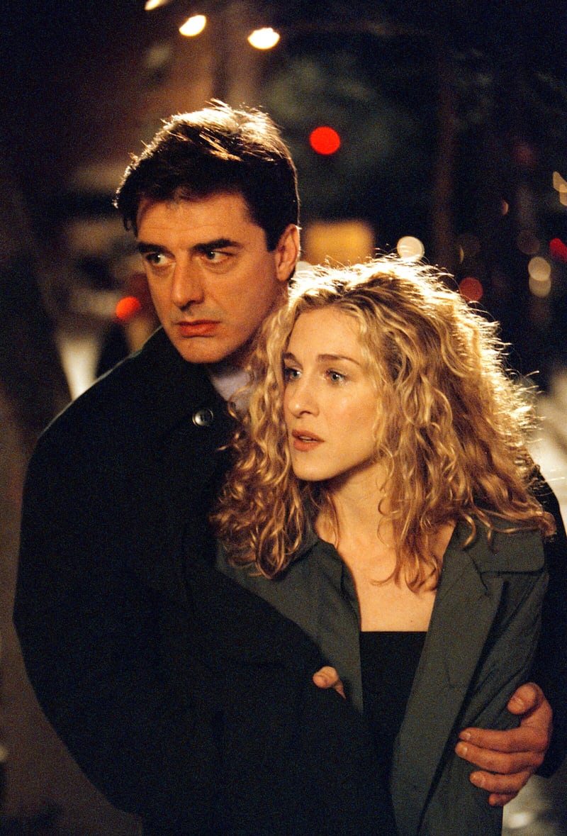 402175 07: (EDITORIAL USE ONLY, COPYRIGHT HBO) Actors Sarah Jessica Parker, as Carrie Bradshaw, and Chris Noth, John James Preston or Mr. Big, on the set of "Sex and the City". (Photo by HBO/Getty Images)