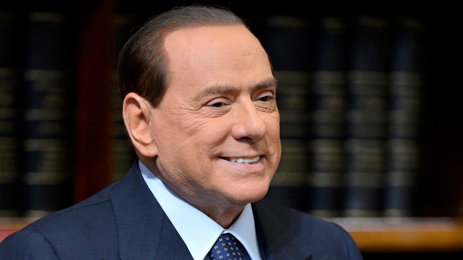 cheats/2012/10/27/berlusconi-i-m-staying-in-politics/berlusconi-obliged-politics-cheat_dj19lo