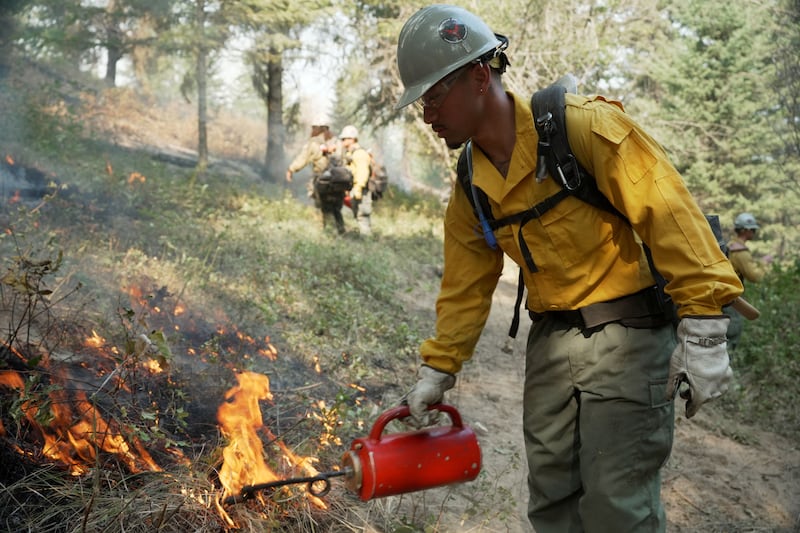 Wildfires burn in Spokane County, Washington, in August.