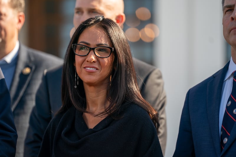 GOP Rep. Lauren Boebert, pictured right before the deposition, leaked a photo of HIllary Clinton testifying to MAGA influencer Benny Johnson, in violation of the agreed to rules.